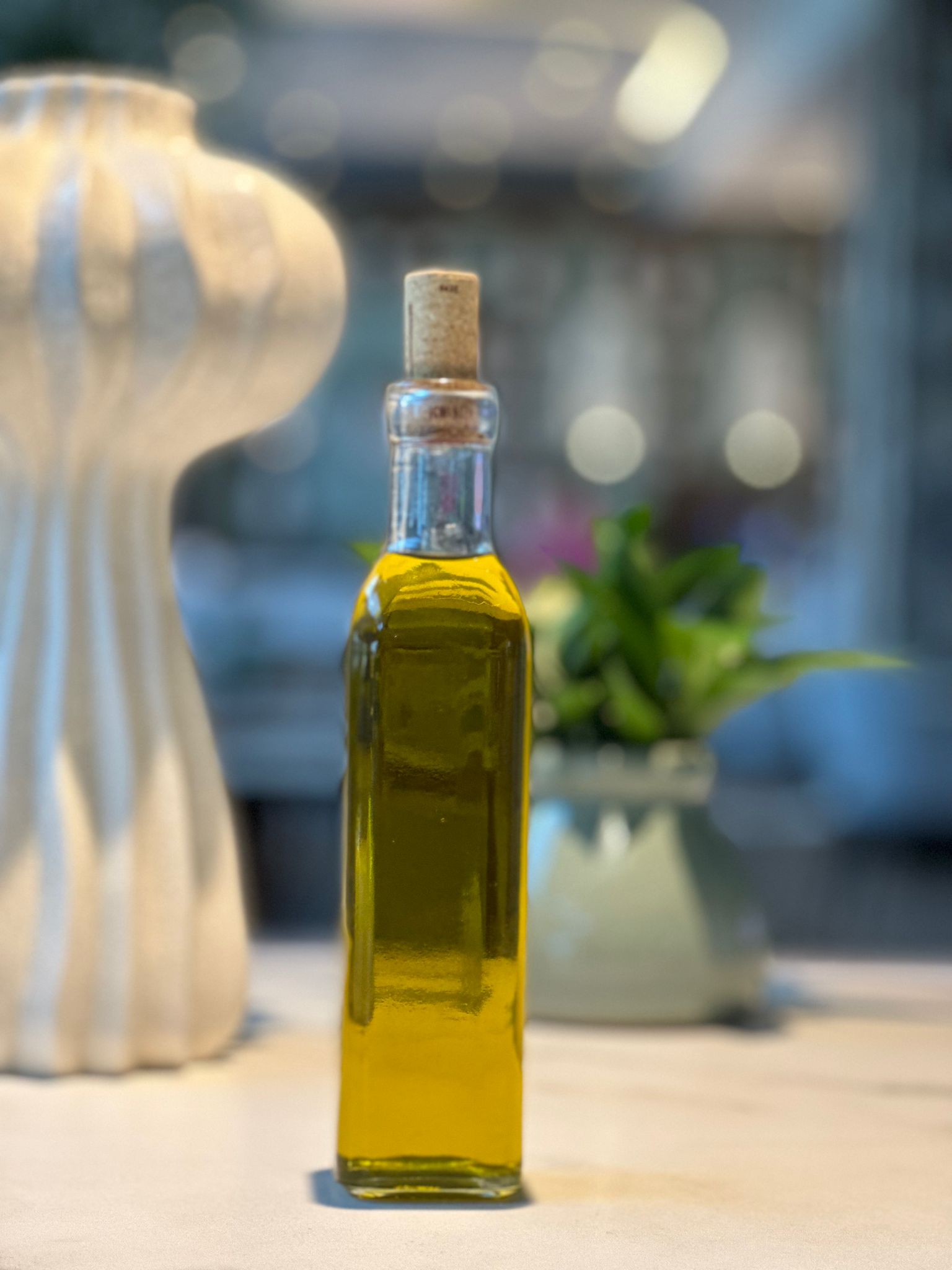 Imagen de la botella del aceite solidario